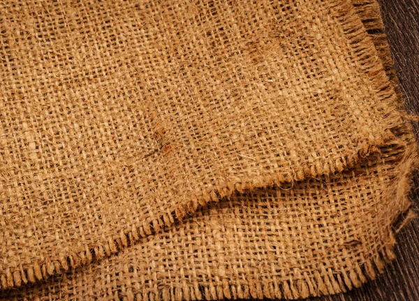 Sfondo strutturato di un panno di tela marrone sabbia — Foto Stock