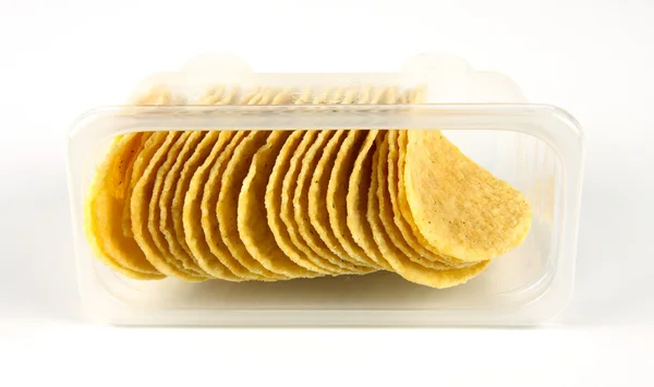 Kartoffelchips på hvid baggrund - Stock-foto
