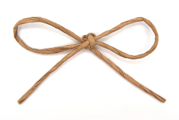 String tied in a bow on white — Stock Photo, Image