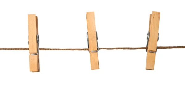 Three clothespins on rope — Stock Photo, Image