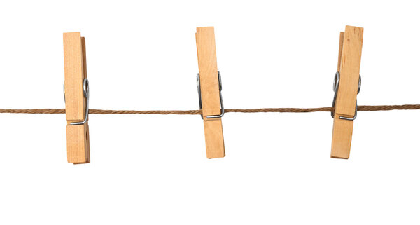 three clothespins on rope