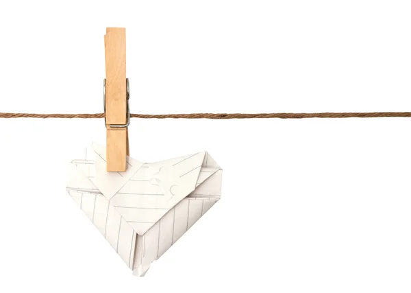 Close up of Paper heart and clothespins attached to a rope — Stock Photo, Image