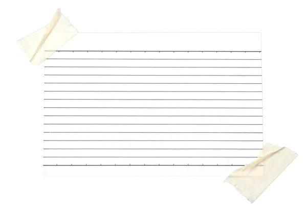 Piece of lined paper stuck with tape — Stock Photo, Image