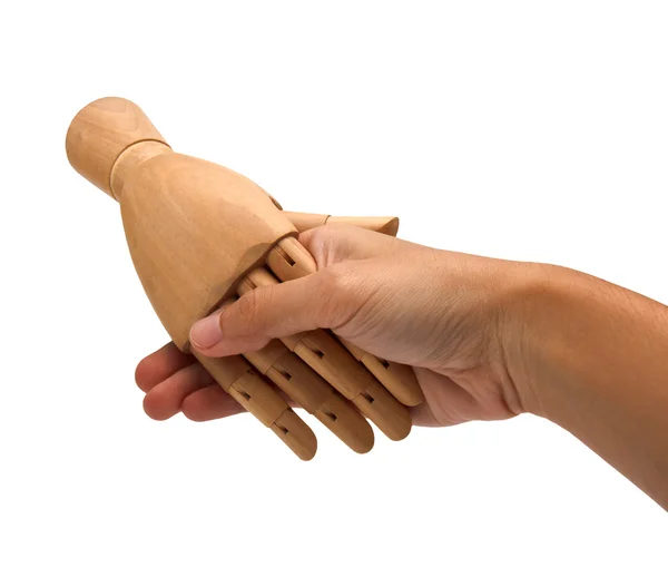 Aperto de mão entre uma mão humana e uma mão de madeira — Fotografia de Stock
