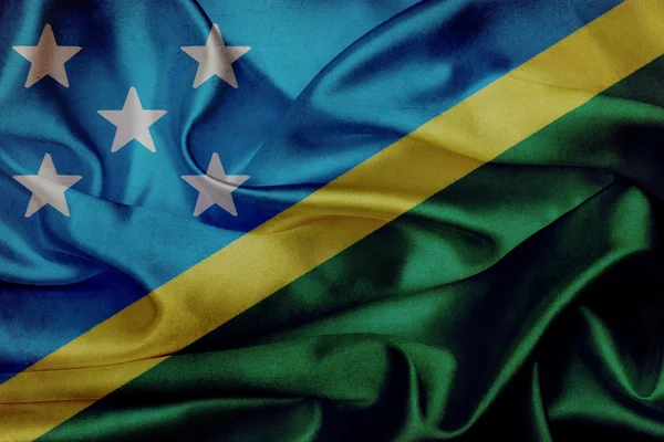 Solomon Adaları grunge dalgalanan bayrak — Stok fotoğraf