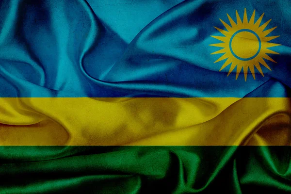 Drapeau grunge Rwanda agitant — Photo