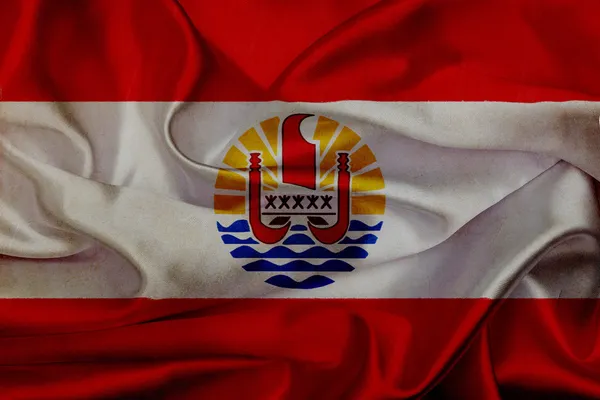 Francia Polinézia grunge integetett zászló — Stock Fotó