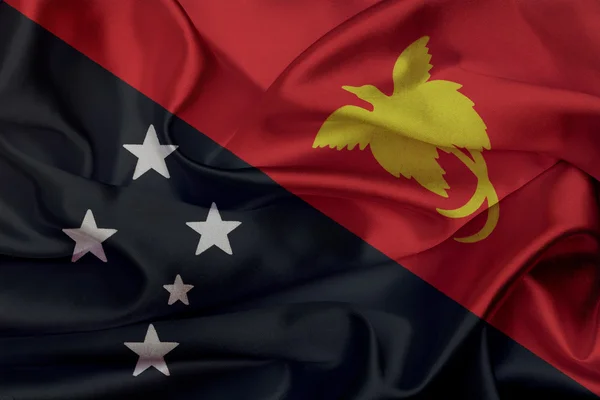 Papua-Neuguinea Grunge schwenkt Flagge — Stockfoto