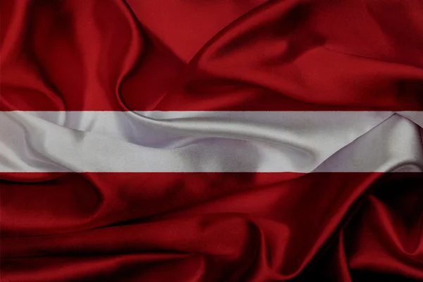 Lettonie drapeau grunge agitant — Photo