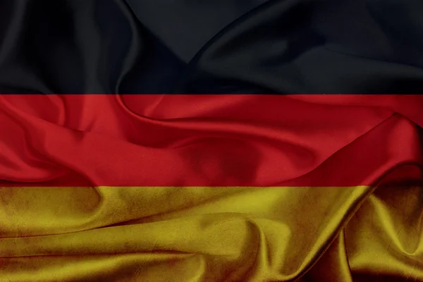 Německá grunge mává vlajkou — Stock fotografie