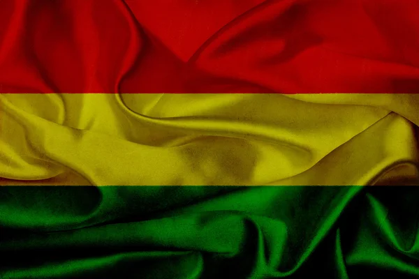 Boliwia nieczysty macha flagą — Zdjęcie stockowe