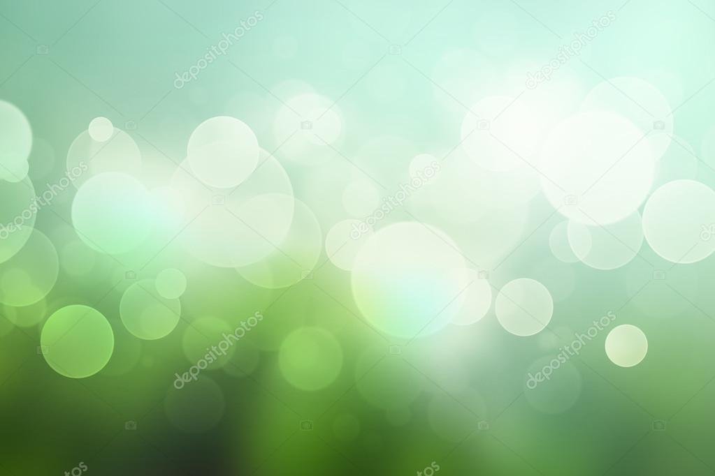 Abstract bokeh background with in soft green colors