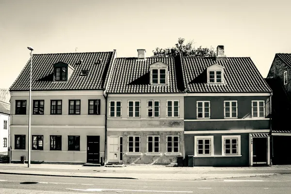 Gebouwen met windows in sepia kleur — Stockfoto