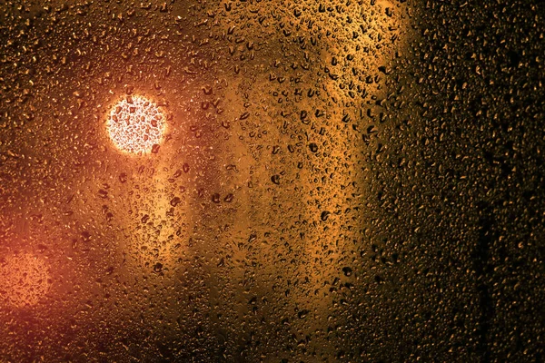 Waterdruppels Een Raam Met Stadsverlichting Achtergrond Avond — Stockfoto