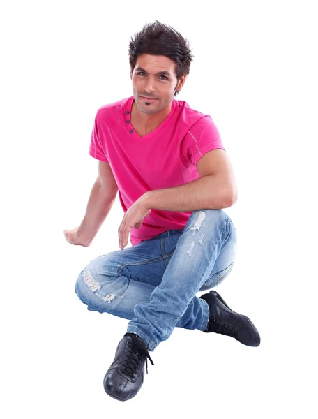 Zemine oturan trendy adam — Stok fotoğraf