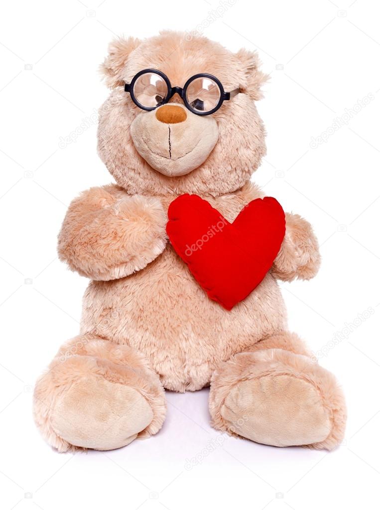 Smart teddy bear with red heart