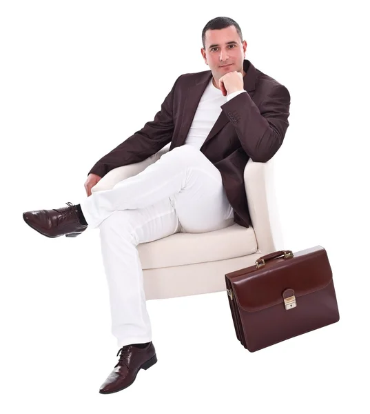 肘掛け椅子に座っているハンサムなビジネスマン — ストック写真