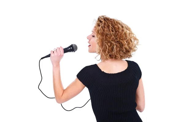 Girl holding microphone — Stock Photo, Image