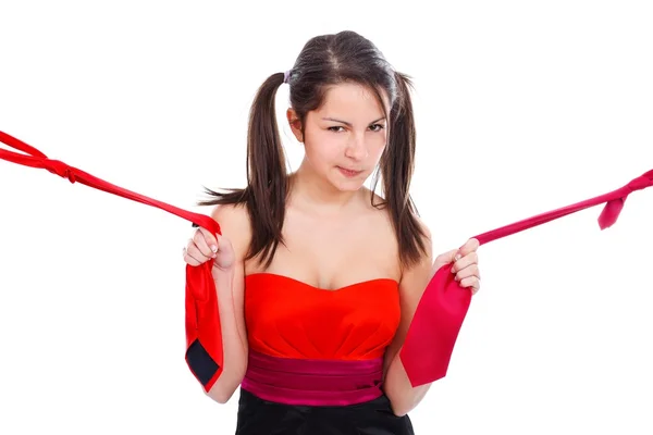 Chica joven tirando de corbatas —  Fotos de Stock