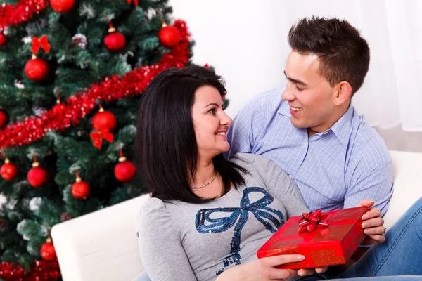 Lovers at Christmas eve — Stock Photo, Image