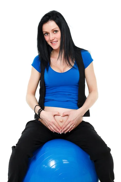 Pregnant woman on gym ball — Stock Photo, Image