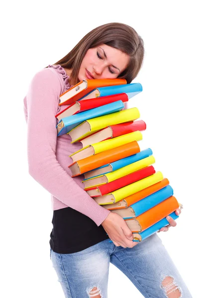 Chica cansada llevando libros — Foto de Stock