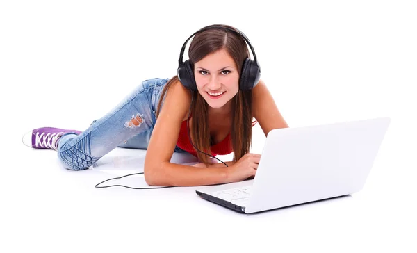 Mulher feliz com fones de ouvido — Fotografia de Stock