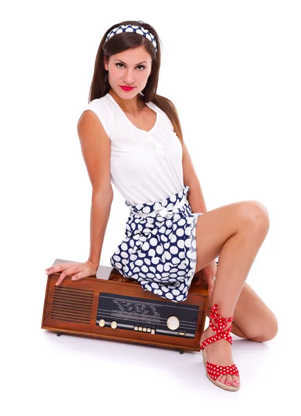 Woman on retro radio — Stock Photo, Image