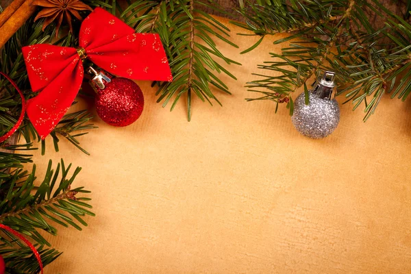 Christmas branch and old paper — Stock Photo, Image