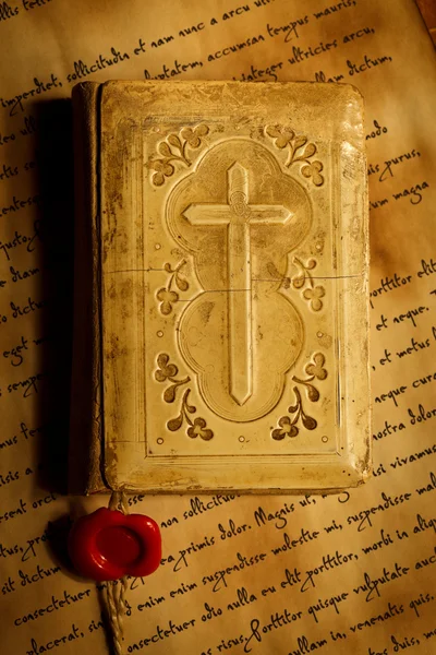 Old prayer book on antique letters — Stock Photo, Image