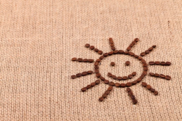 Sonriente sol de granos de café —  Fotos de Stock