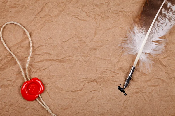 Wax seal and quill pen — Stock Photo, Image