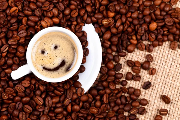 Cup of coffee with smiley face — Stock Photo, Image