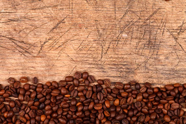 Bottom border of coffee beans — Stock Photo, Image