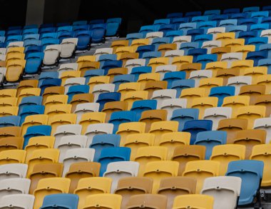 Stadyumu'nun tribünleri boş renkli koltuk.