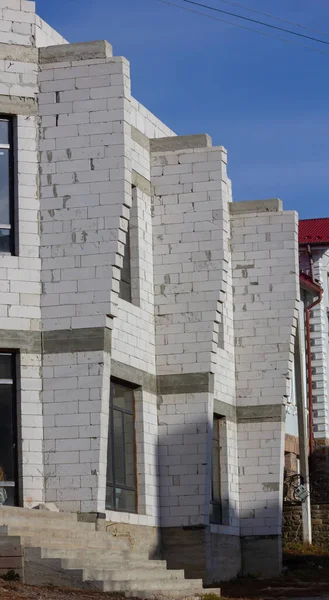 House under construction. Prefabricated building elements. Cement.