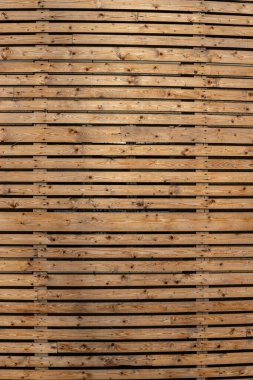 Kahverengi ahşap yapısı doğal ağaçtan geliyor. Tahta panelin güzel koyu bir deseni var, ahşap döşeme dokusu..