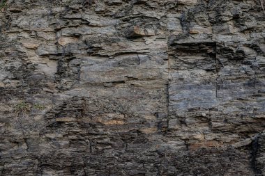 Taşların dokusu ve arkaplanı. Kaya dokusu yakın plan.