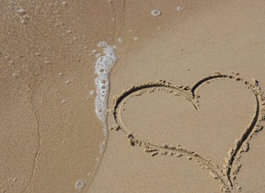 Kumun kalbi Seni kum tanesi gibi seviyorum.