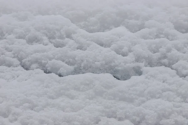 Vacker Vinter Bakgrund Med Snöig Mark Naturlig Snöstruktur Vindskulpterade Mönster — Stockfoto