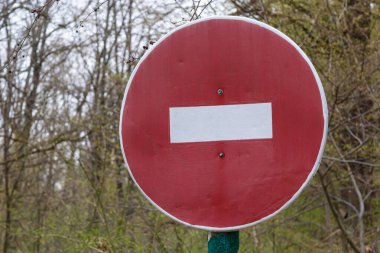 Road Sign STOP, stop brick, forbidding sign at the entrance to the forest or Park, prohibition of movement in the forest, prohibition of passage to the forest Park in spring and autumn.