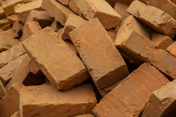 stock image Solid clay brick used for construction. Background, brown red color.