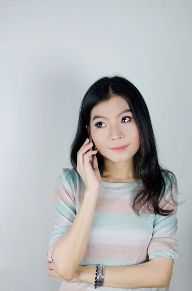 Asian woman talking and thinking — Stock Photo, Image