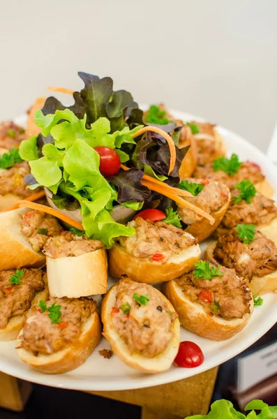 Deep fried sliced breads with pork on top — Stock Photo, Image