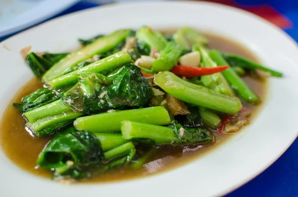 Fried kale and vegetables in oyster sauce — Stock Photo, Image