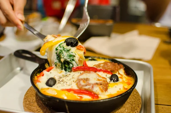 Baked Lasagna with minced pork bolognese sauce served in a black — Stock Photo, Image