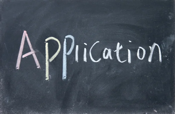 Application title written with chalk on blackboard — Stock Photo, Image