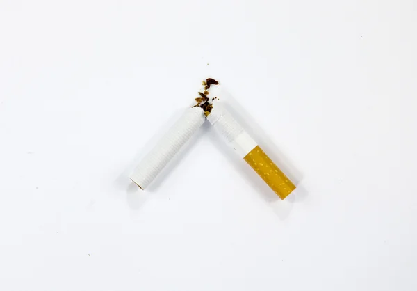 Sigaretta e sfondo bianco — Foto Stock