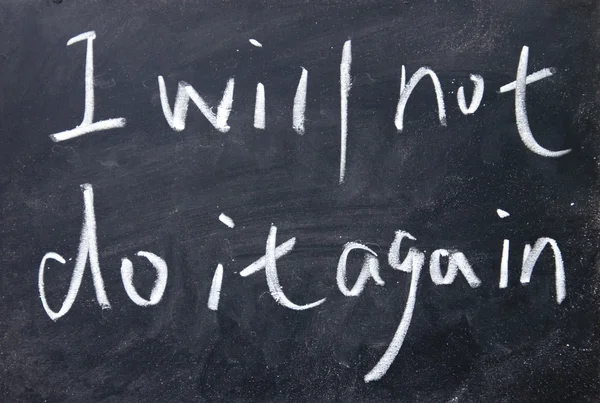 I will not do it again title written with chalk on blackboard — Stock Photo, Image