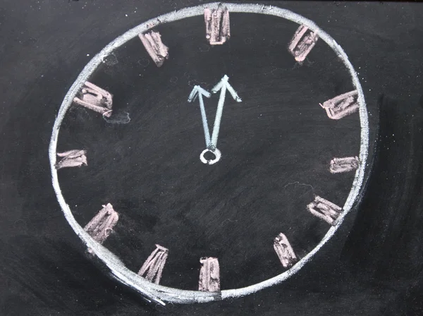 Clock drawing on the blackboard — Stock Photo, Image